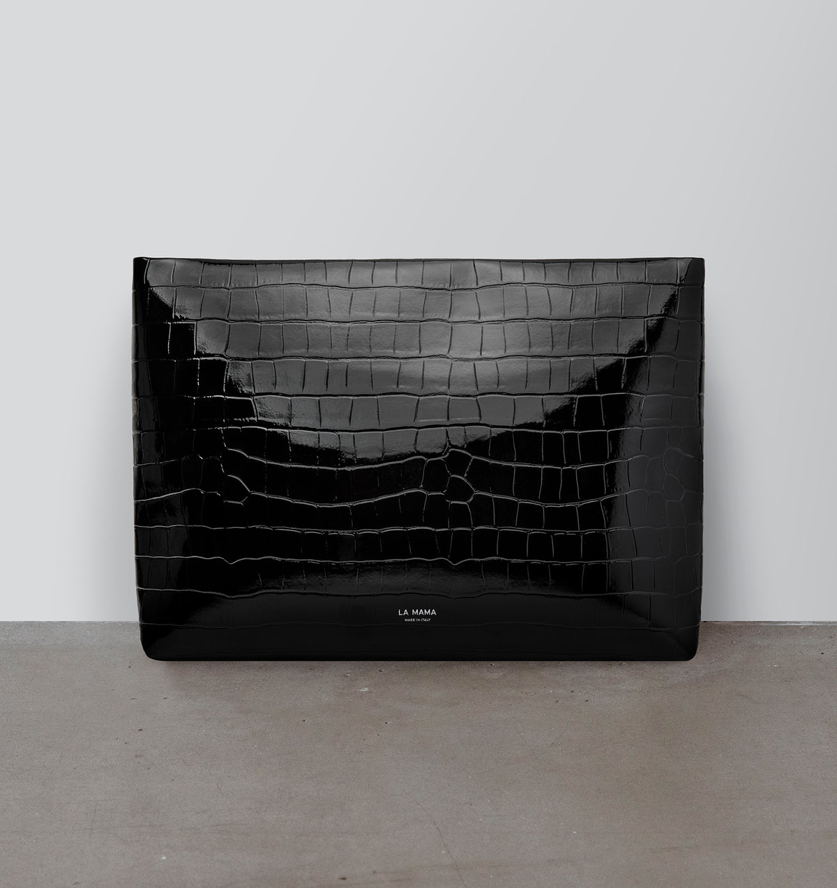 Front view of the LA MAMA Large Pouch in Black Lacquer Croco, crafted from croc-embossed vegan leather.