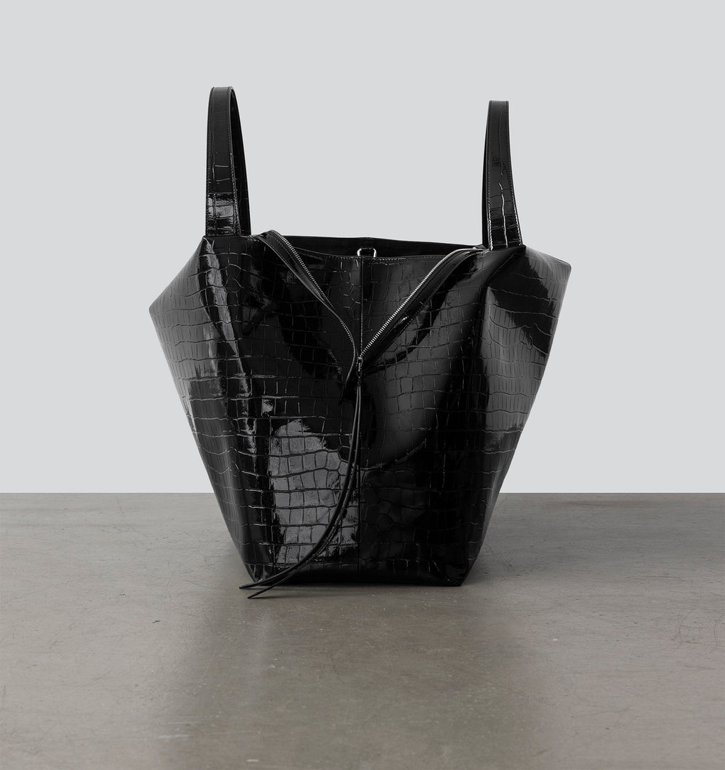 Front view of the LA MAMA LM1 luxury handbag in Black Lacquer Croco, crafted from croc-embossed vegan leather.