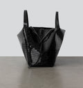 Front view of the LA MAMA LM1 luxury handbag in Black Lacquer Croco, crafted from croc-embossed vegan leather.