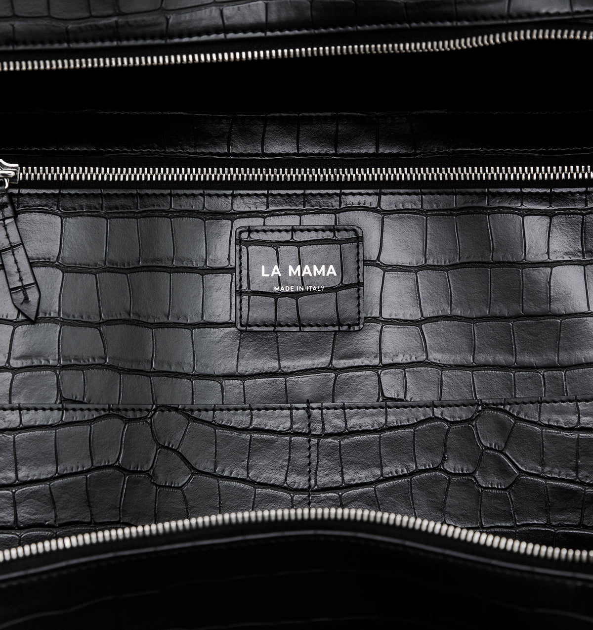 Close-up of the LA MAMA LM1 handbag in Black Matte Croco.