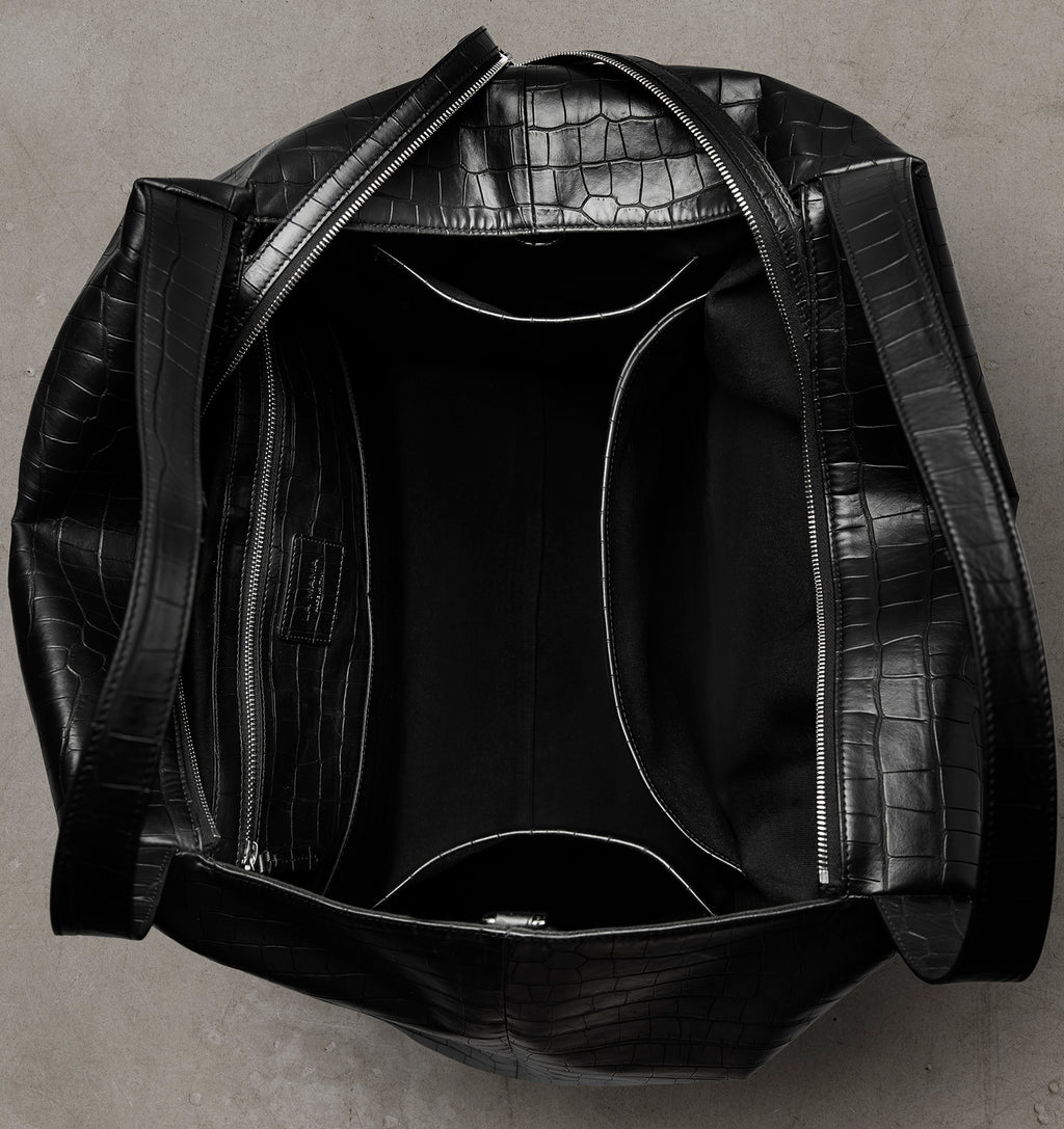 Interior view of the LA MAMA LM1 Black Matte Croco handbag with canvas lining.