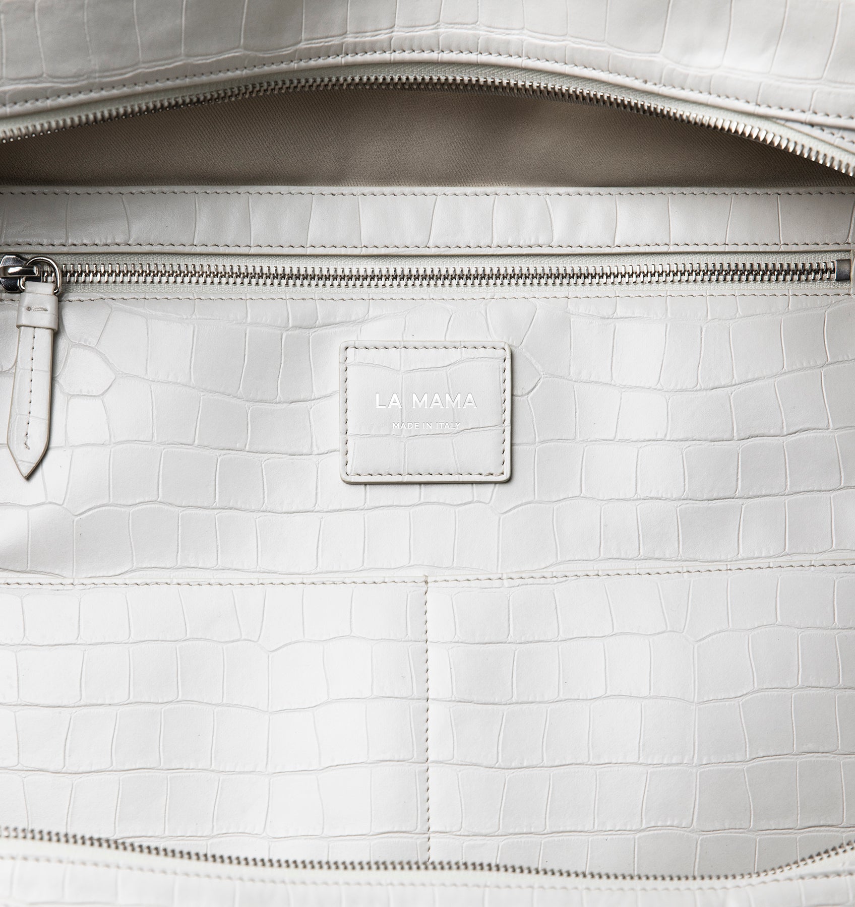 Close-up of the LA MAMA LM1 handbag in White Matte Croco.