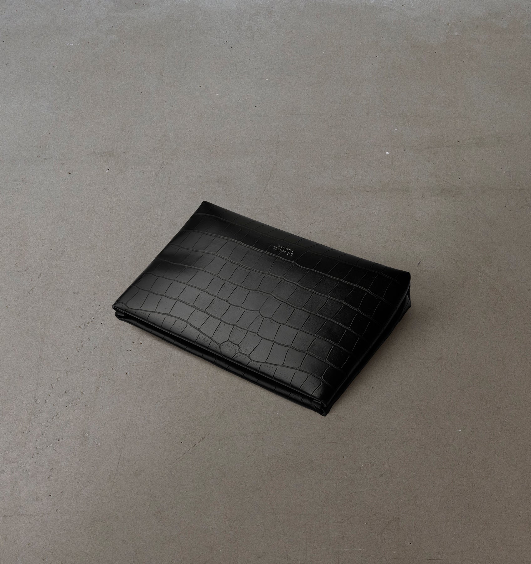 Top view of the LA MAMA Small Pouch in Black Matte Croco, crafted from croc-embossed vegan leather.