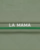 Video of woman walking past an industrial door carrying carrying the LA MAMA XL Pouch in White Matte Croco in her hand.